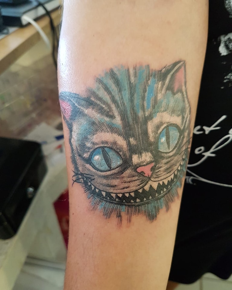 Grinsekatze Tattoo Alice im Wunderland