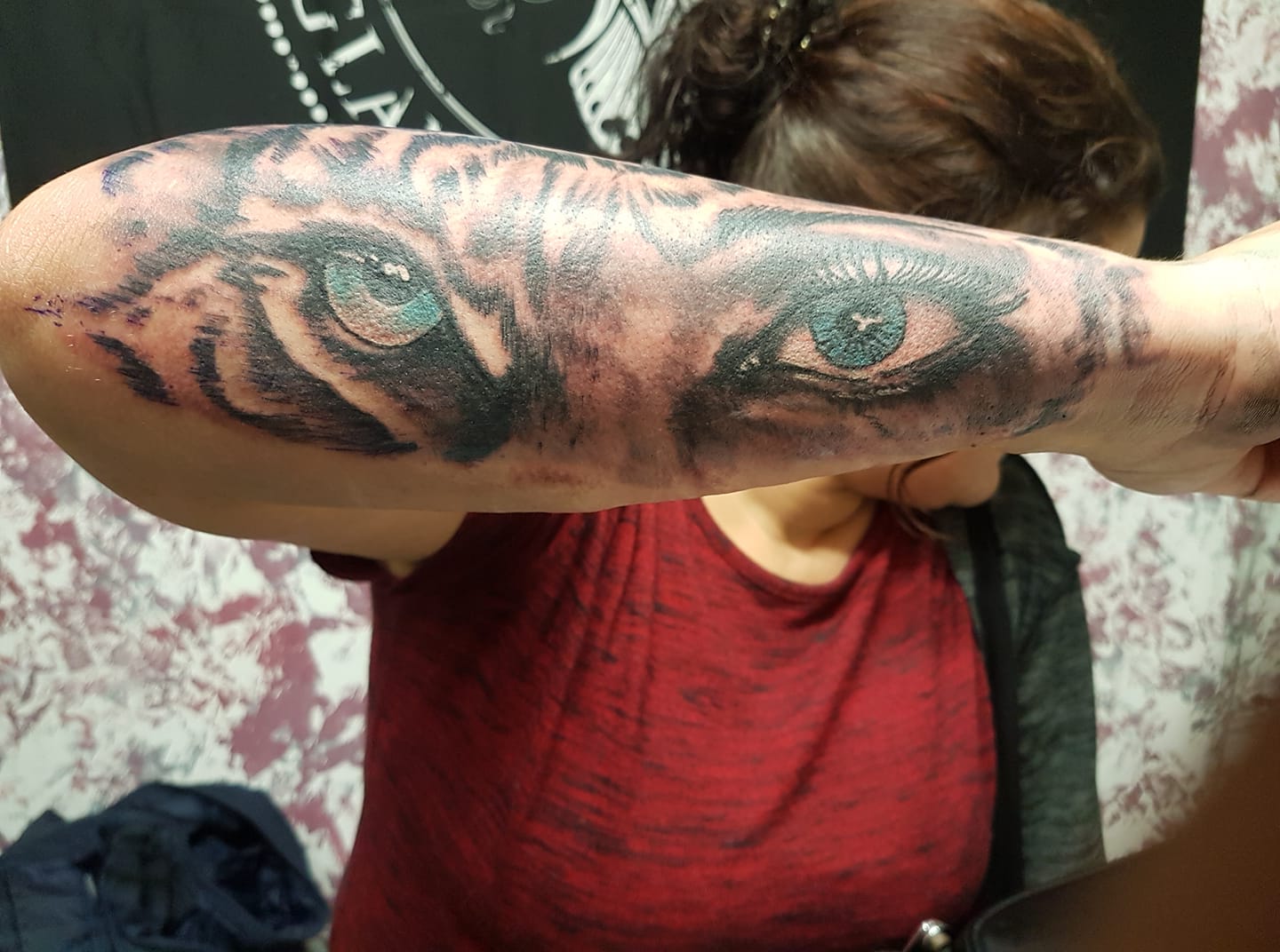 Tattoo Tiger mit blauen Augen